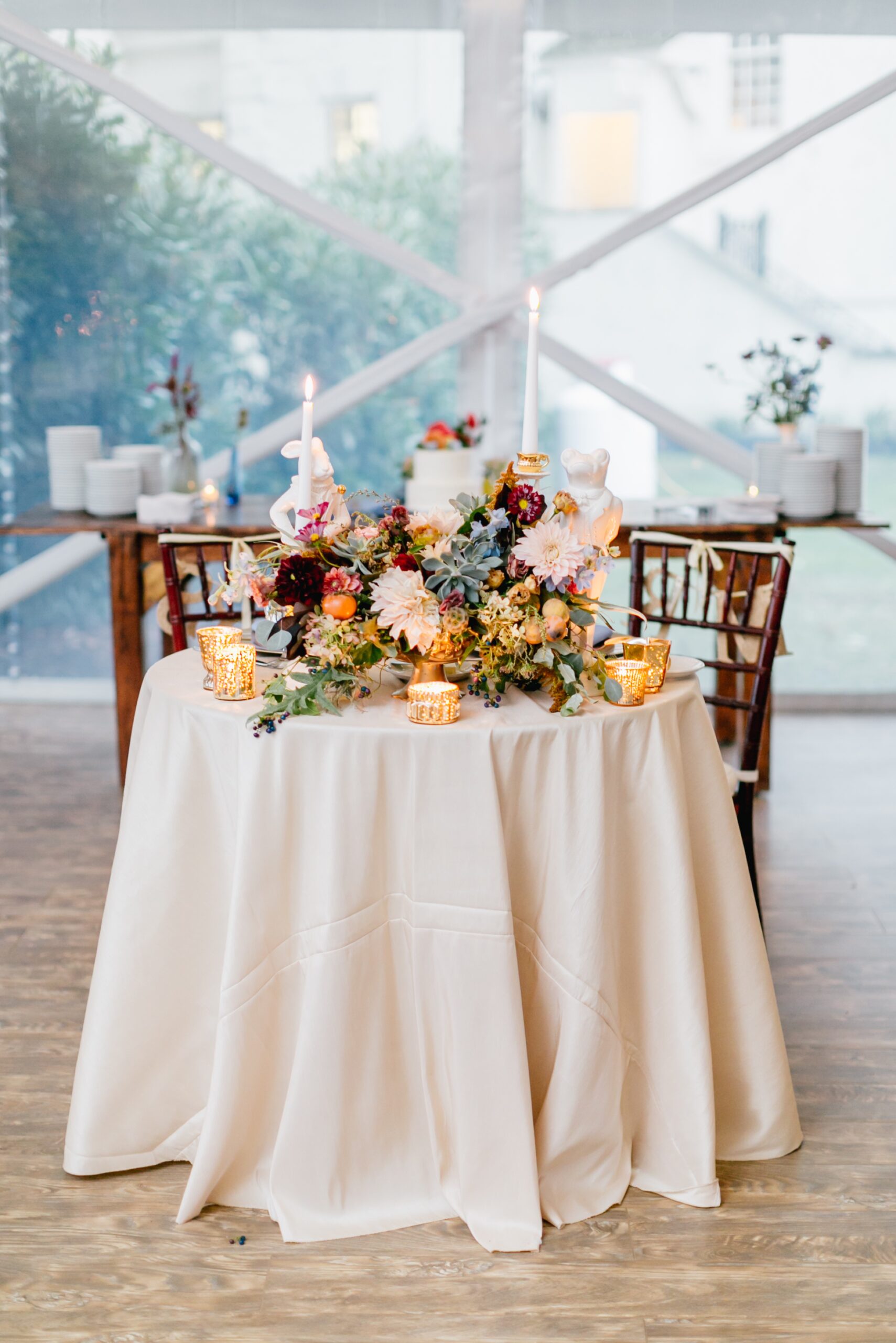 Whimsical sweetheart table at an estate wedding reception