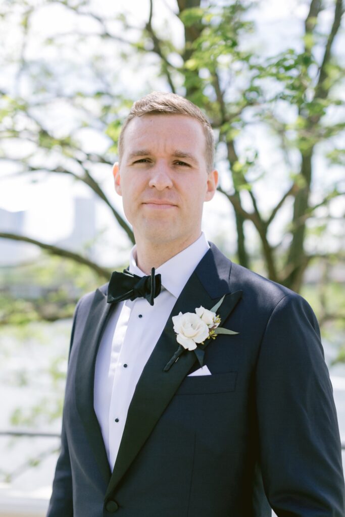 Groom on a sunny spring wedding by Emily Wren Photography