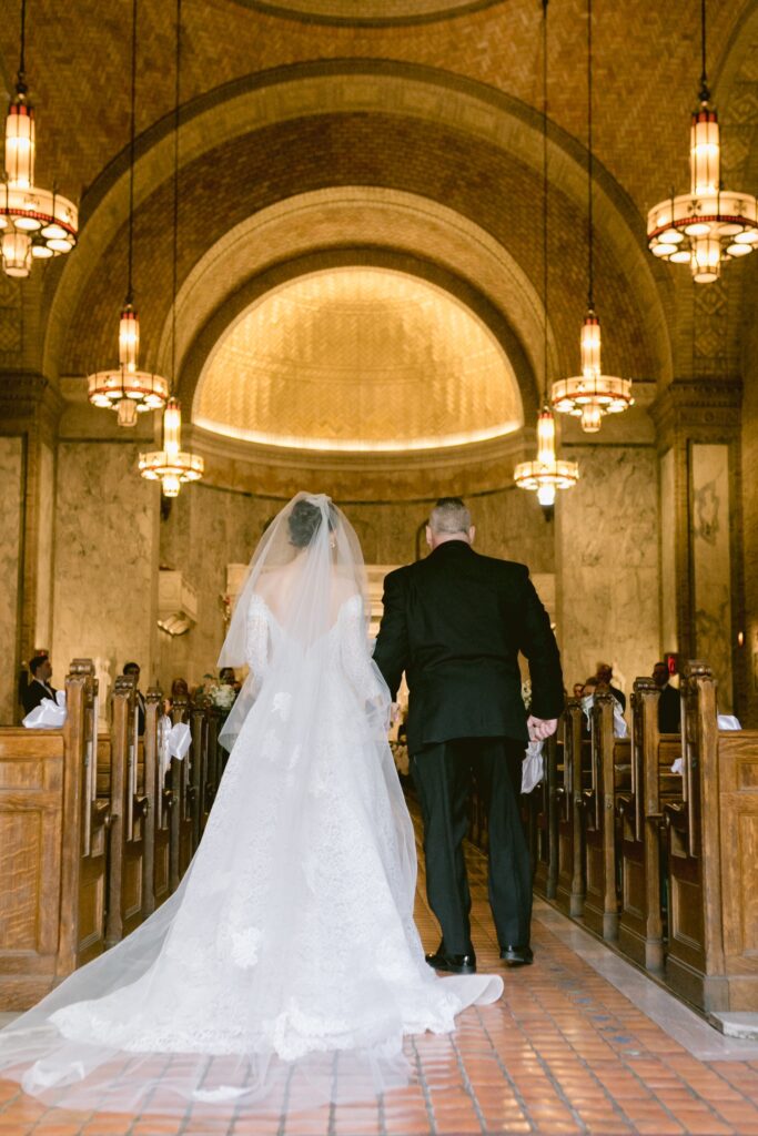 Bride walking down the aisle at St. Patrick Church Philadelphia