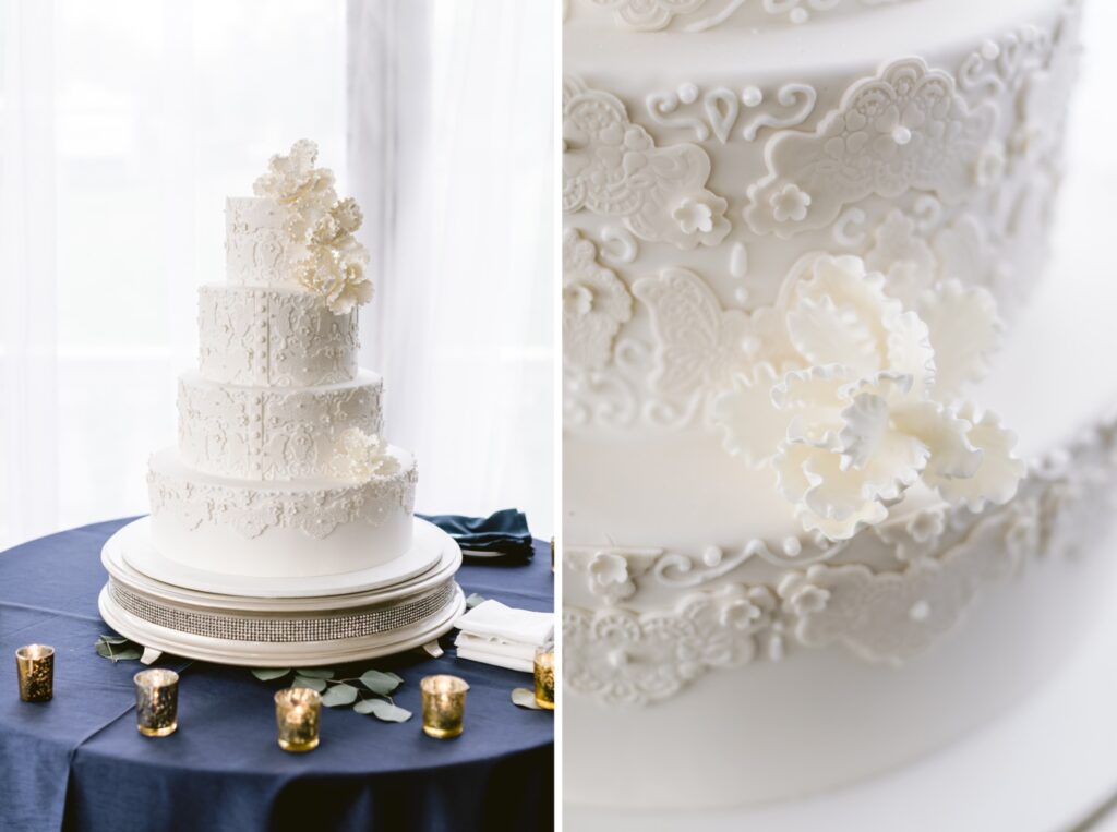 White wedding cake with intricate designs for an elegant spring wedding reception