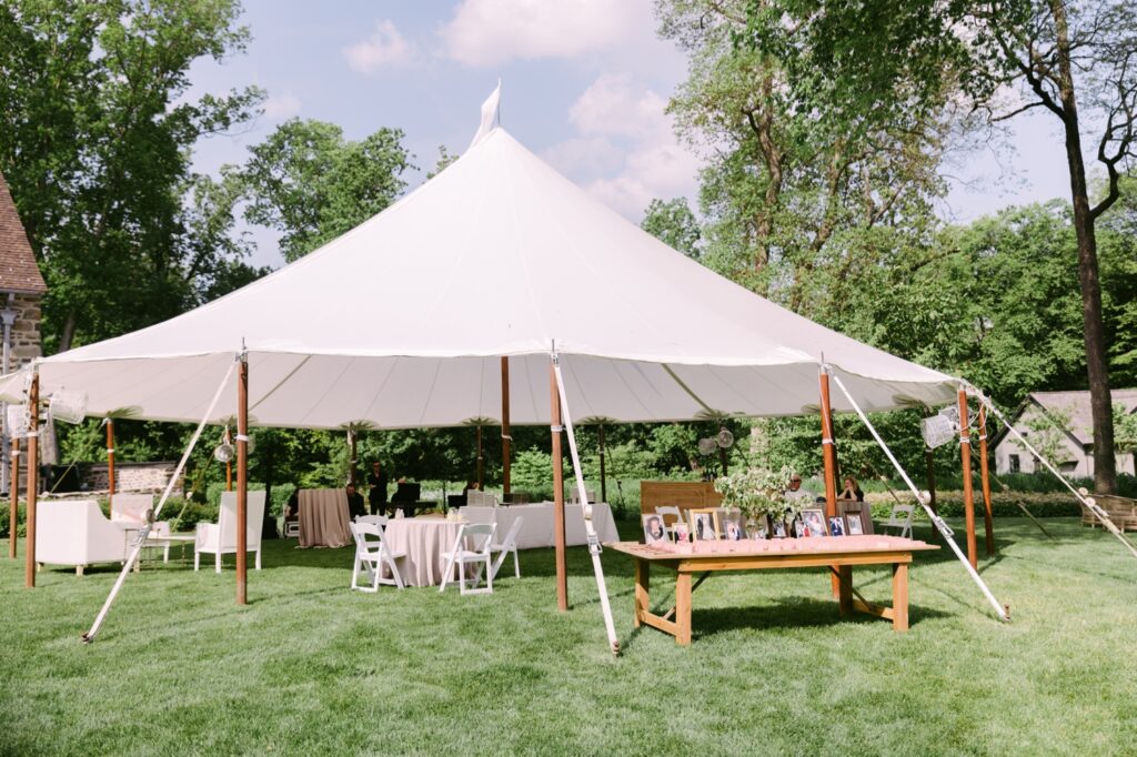 Cocktail hour tent at a backyard wedding on a romantic spring wedding day in Pennsylvania