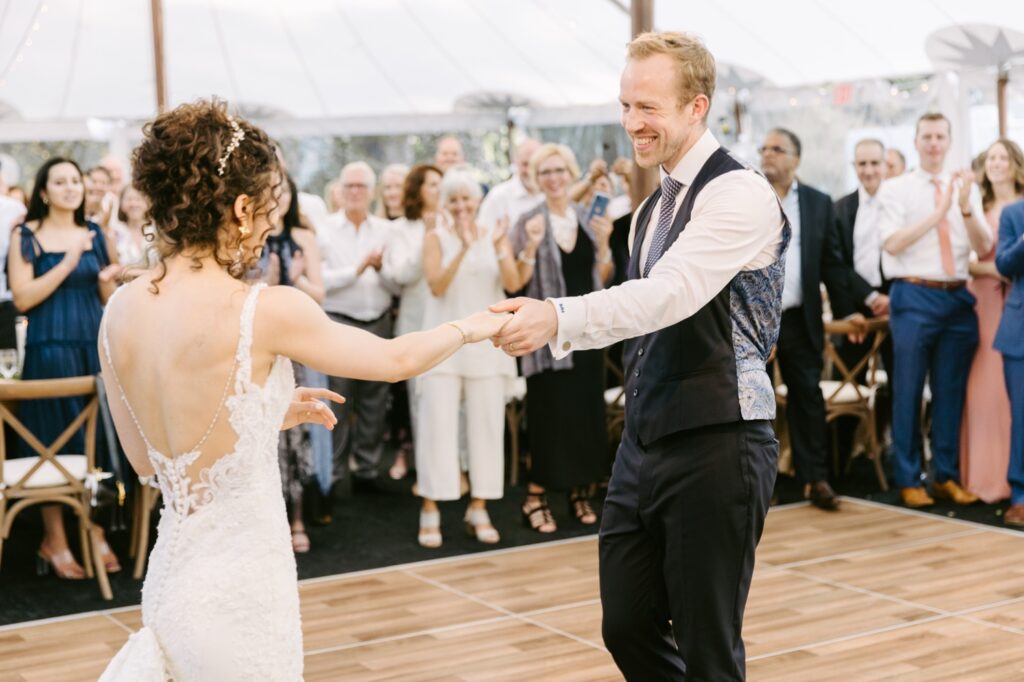 Newlywed couple's first dance at an enchanted forest wedding reception on the Main Line