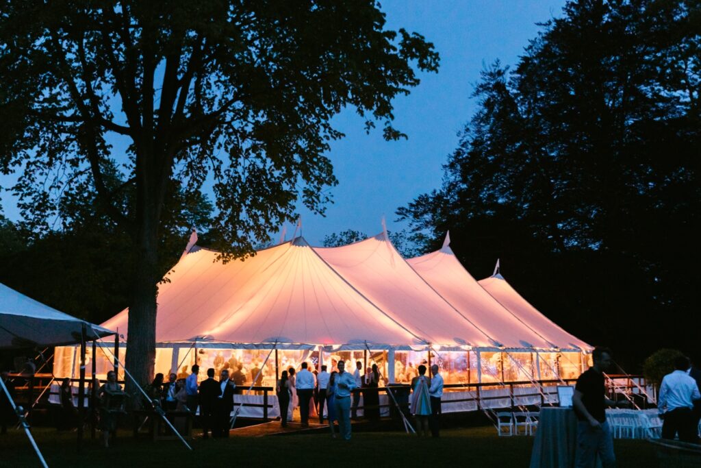 Luxury wedding reception tent at night on a romantic spring wedding day on the Main Line in Pennsylvania