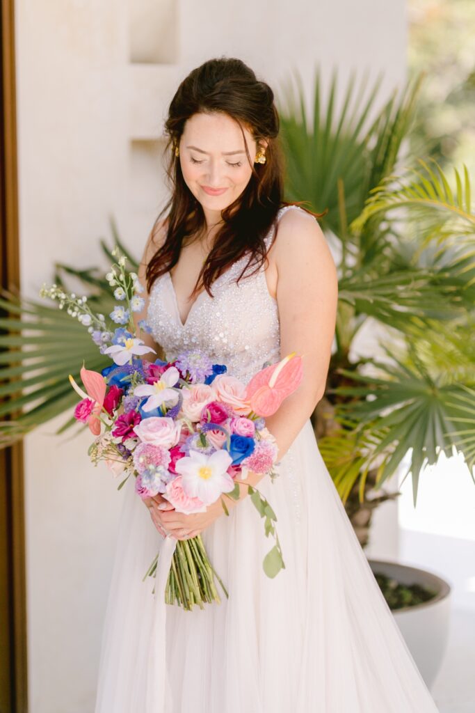 Bride and wedding bouquet on the morning of a tropical wedding celebration