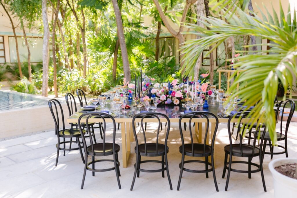 Modern and bold dinner table at a tropical wedding reception