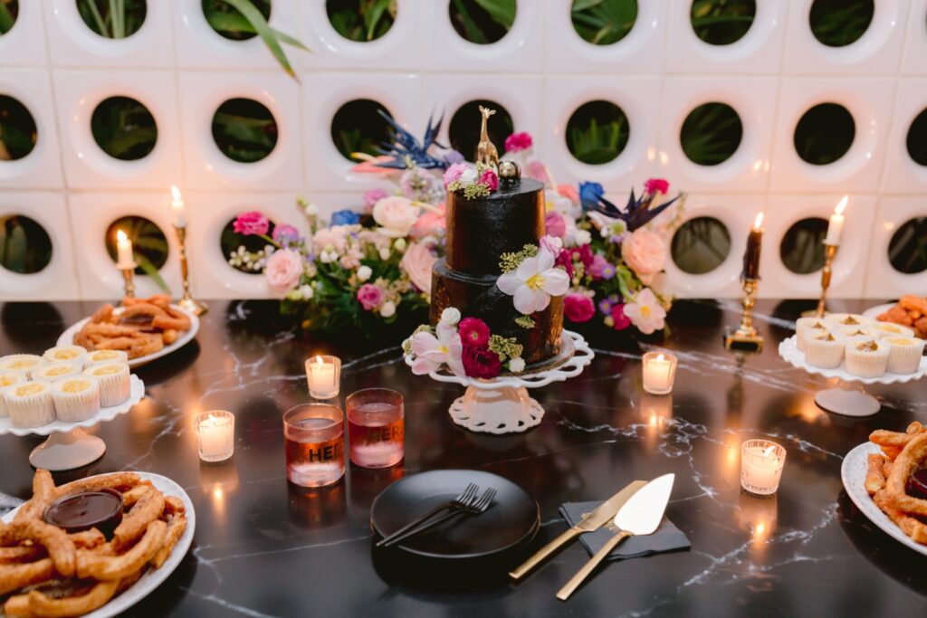 Monochromatic black wedding cake at a modern wedding reception