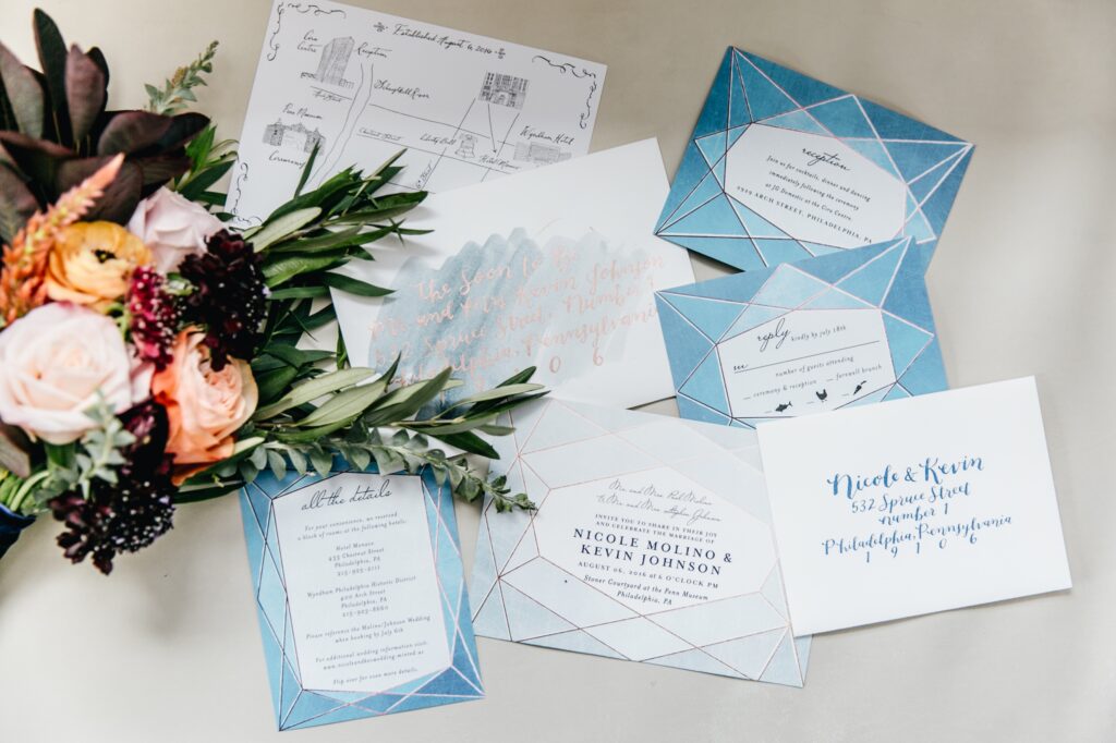 Blue geometric invitation suite for a modern wedding