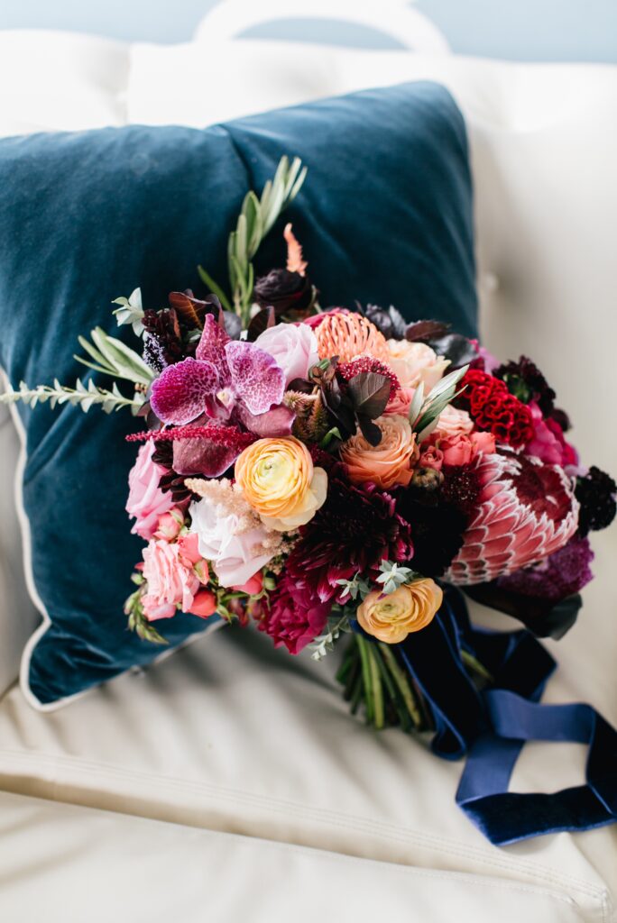 Colorful modern wedding bouquet with tropical flowers