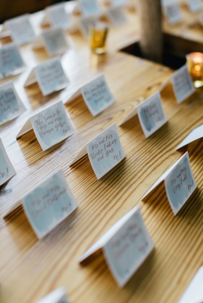Hand calligraphy place cards for wedding guests