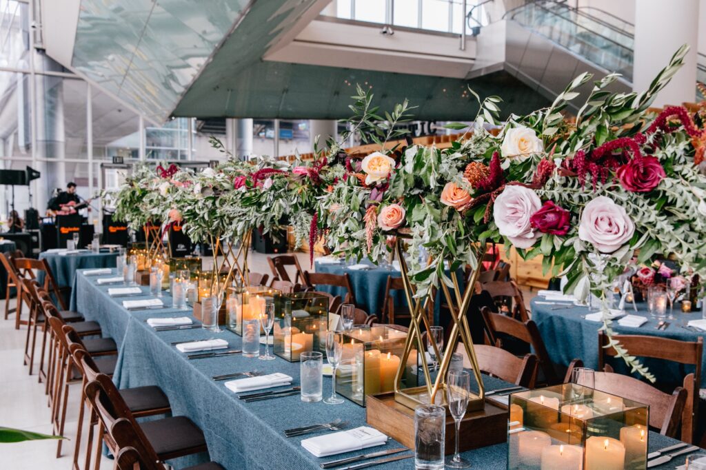 Colorful and dramatic table centerpieces at a modern wedding reception at Cira Centre