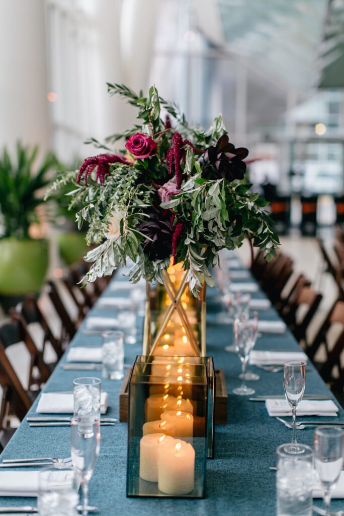 Bold and romantic flower centerpieces at an urban wedding reception