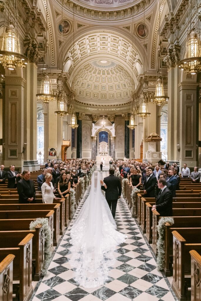 Bride walking down the aisle at the Cathedral Basilica in Philadelphia