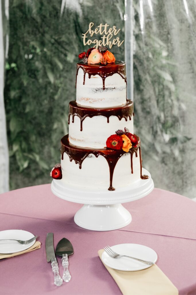 LGBTQ wedding cake at a vibrant fall wedding reception at Glen Foerd on the Delaware