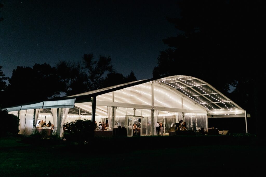 Glen Foerd's reception tent at night on a playful wedding day