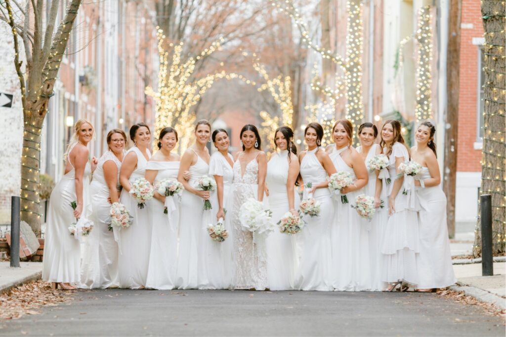 Bridal party on a winter's day in Philadelphia with twinkle lights
