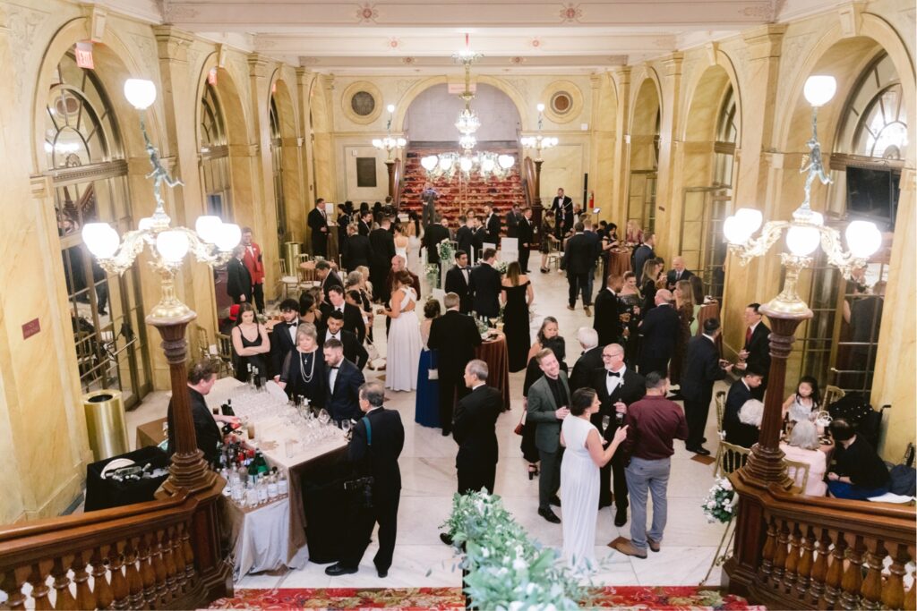 Guests enjoying cocktail hour at the Academy of Music