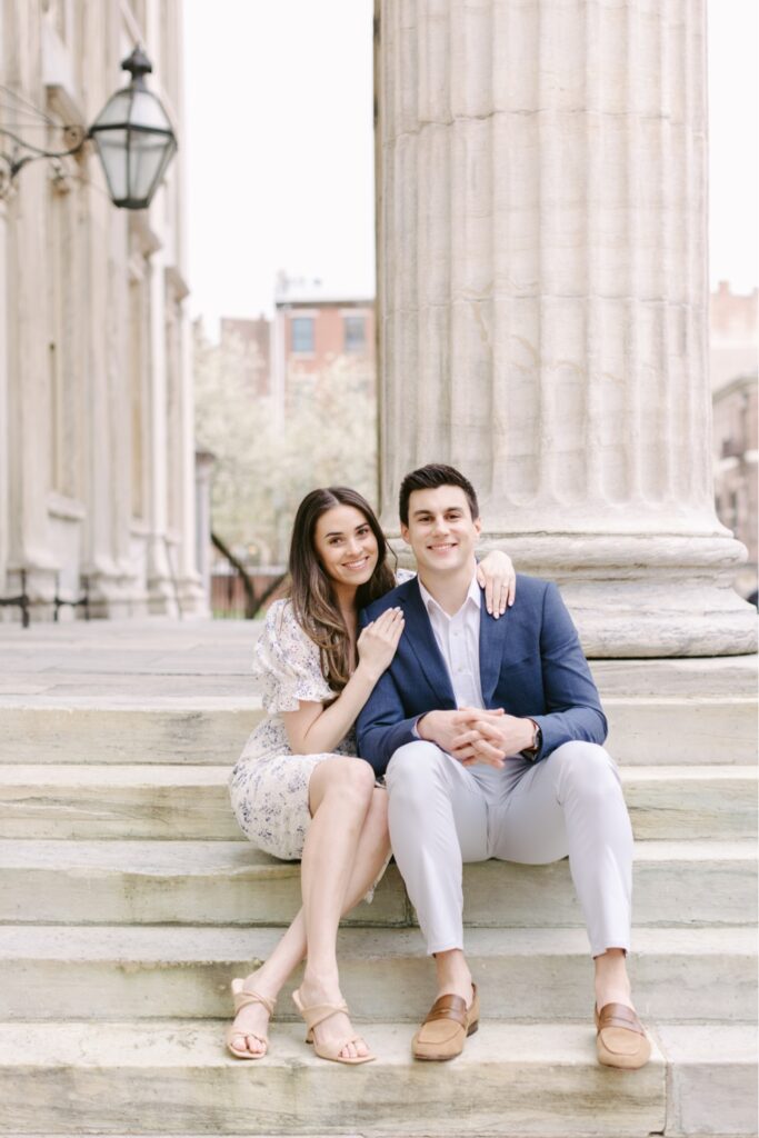 Engaged couple at the First Bank in Philadelphia during a spring portrait session