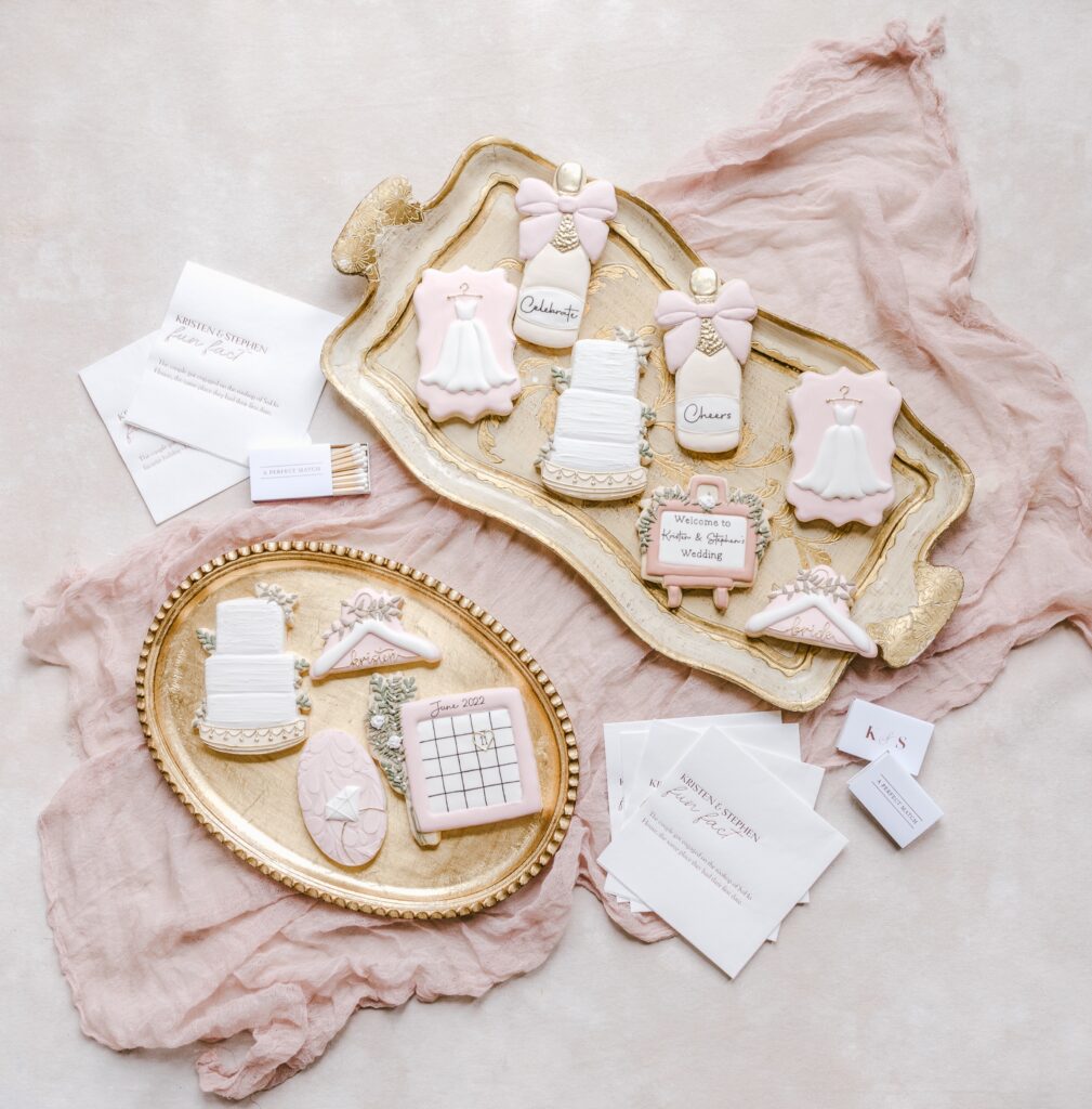 Custom wedding themed cookies in pink and blush