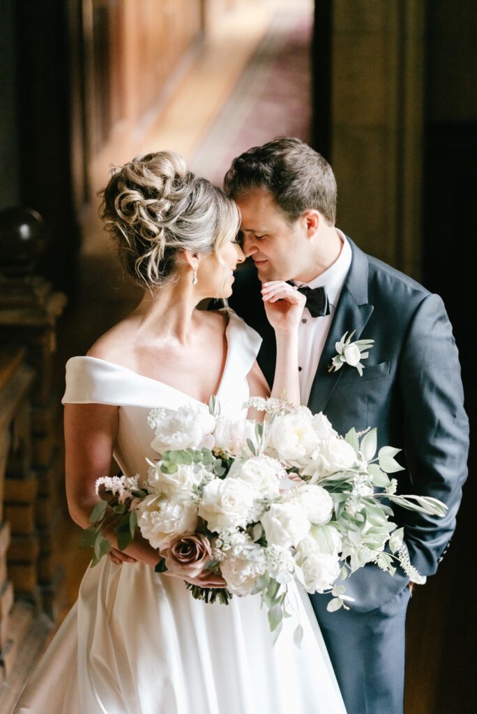 Bride and groom inside a historic mansion in Radnor