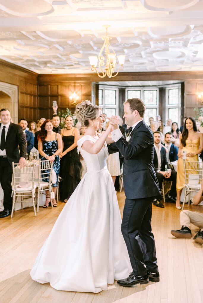 Newlyweds share their first dance at a timeless wedding reception near Philadelphia