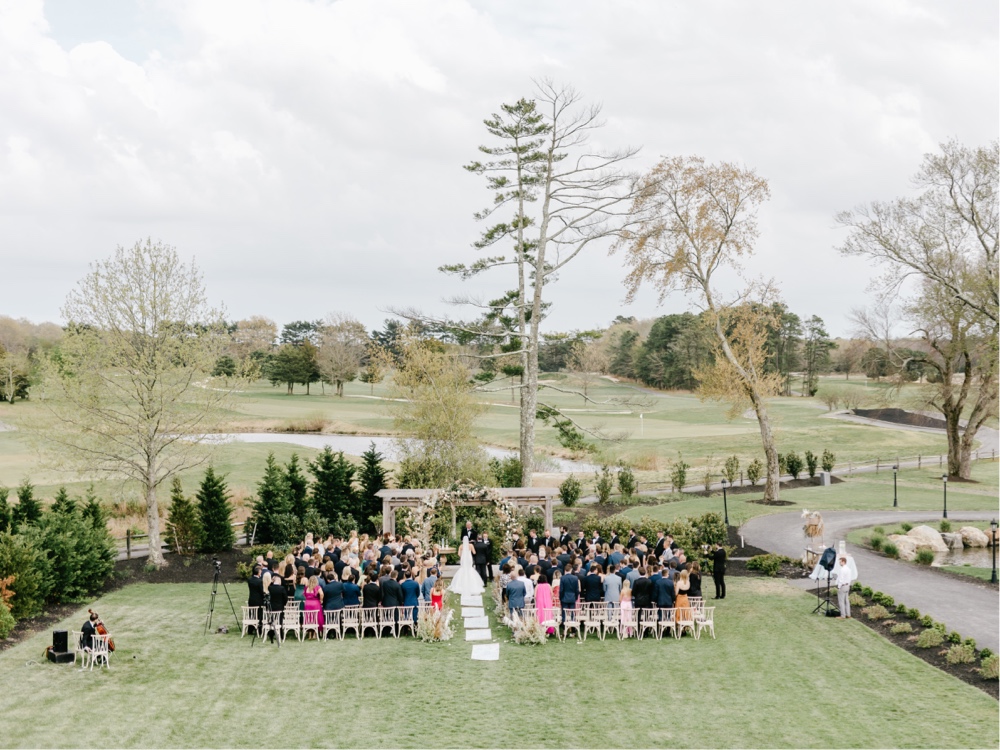 Outdoor spring wedding ceremony at Renault Winery in New Jersey