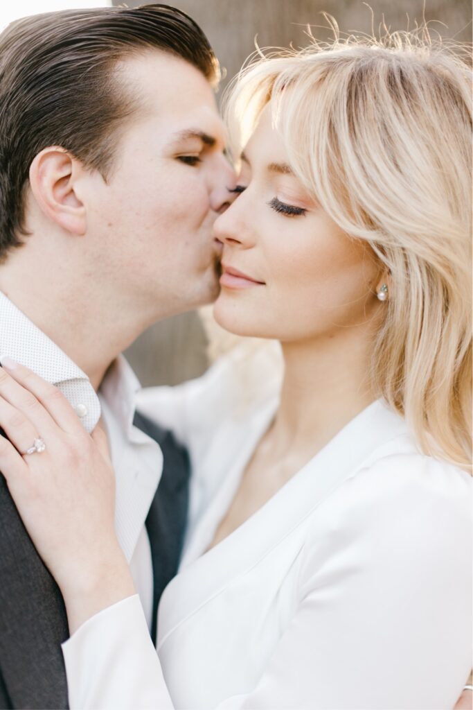 Engaged couple kissing during a timeless sunset engagement shoot near Philadelphia