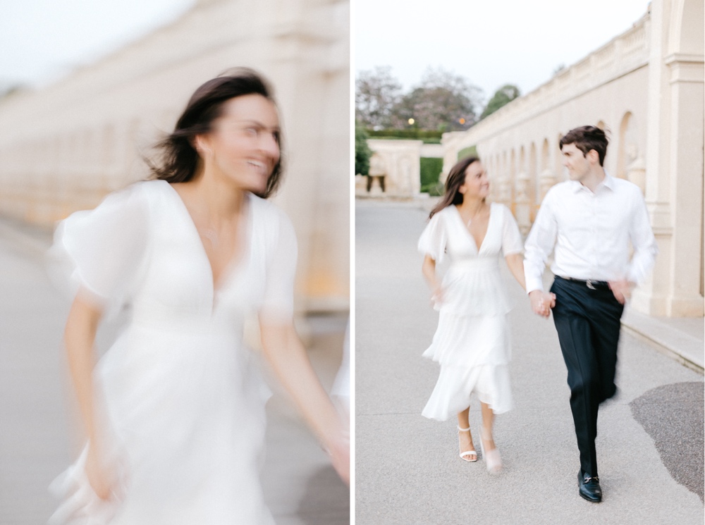 Couple holding hands and running during a golden hour engagement shoot at Longwood Gardens