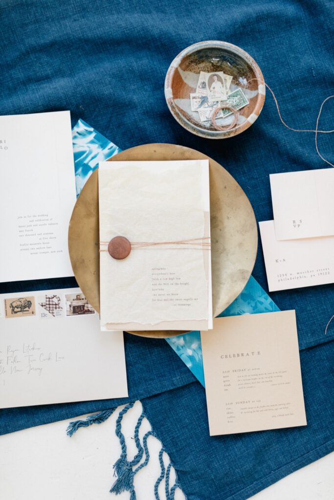 Custom wedding invitation suite with blue accents for a styled shoot in New York by Emily Wren Photography
