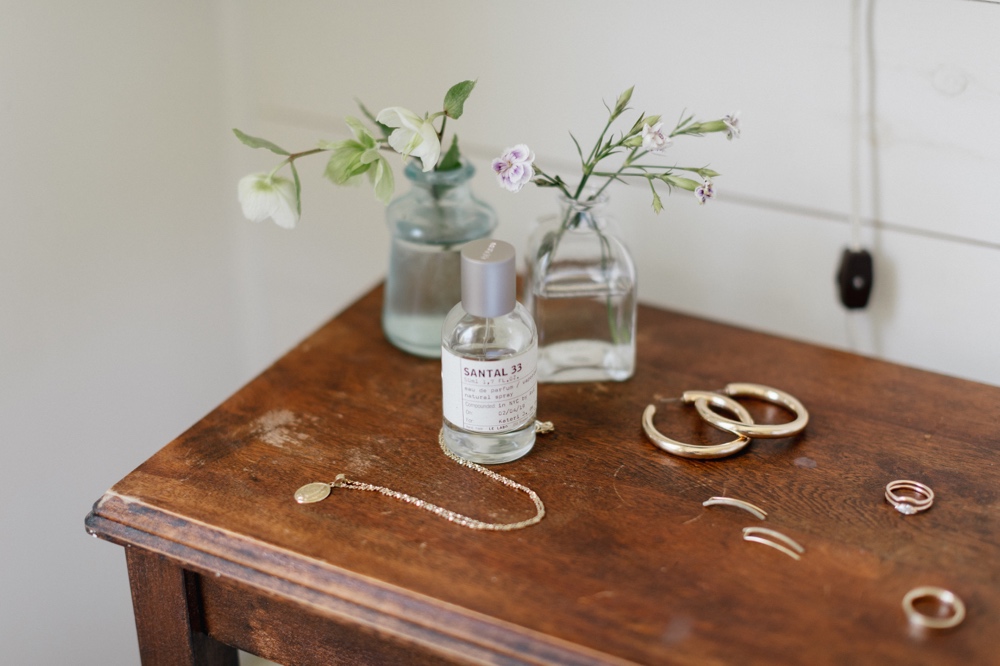 Bridal perfume and jewelry on the morning of an intimate destination wedding