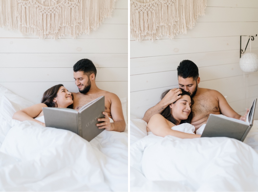 Couple snuggling in bed the morning of their intimate destination wedding in upstate New York
