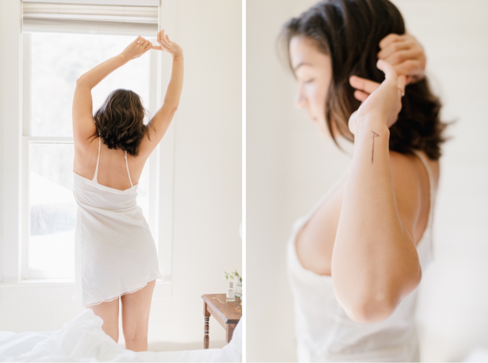 Bride stretching before getting ready for an intimate woodland wedding by Emily Wren Photography