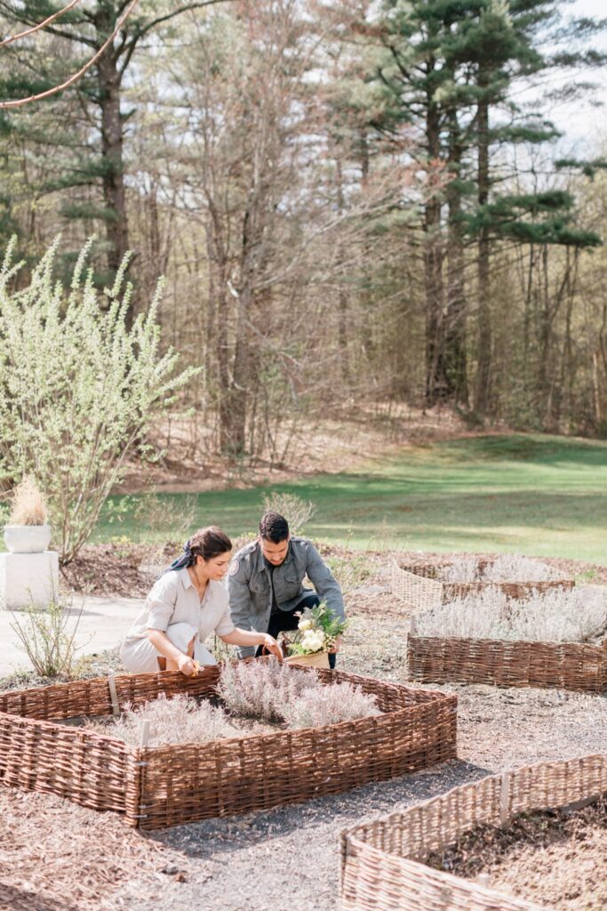 Couple selecting the greenery for their wedding day at a luxury bed and breakfast in New York