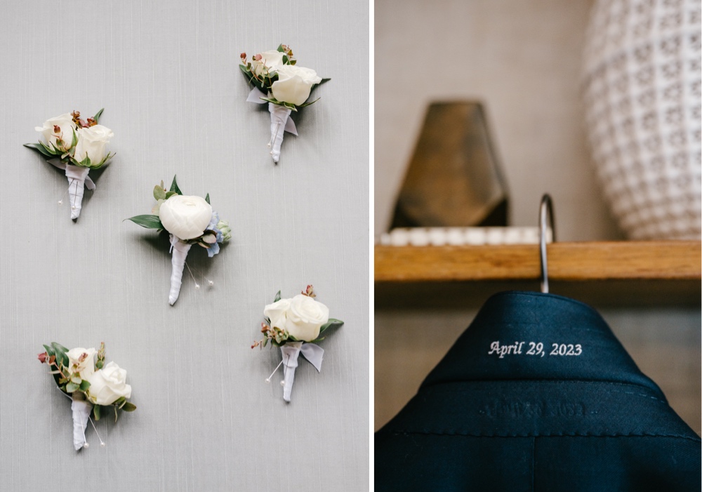 Boutonnières and a groom's embroidered suit jacket before an elegant spring wedding at Natirar