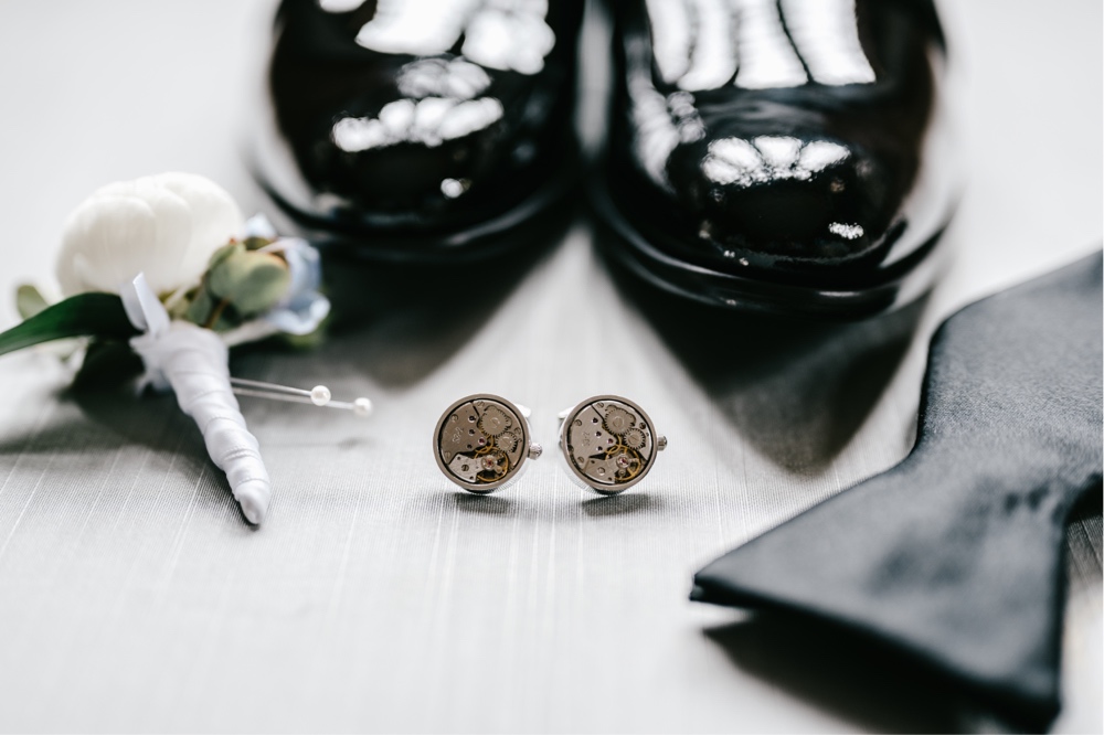 Custom gear shaped cufflinks for the groom for an upscale spring wedding