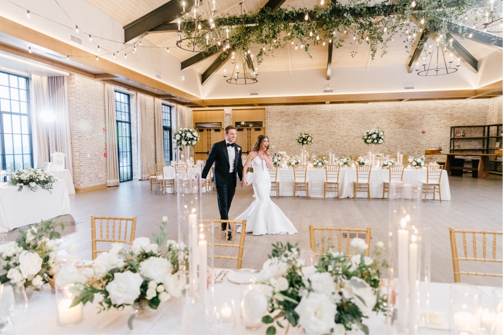 Bride and groom see their wedding reception decor for the first time at Natirar