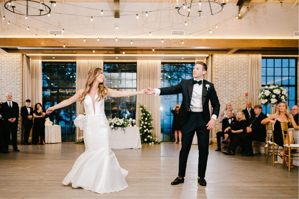 Newlyweds share their first dance at an elegant wedding reception in New Jersey