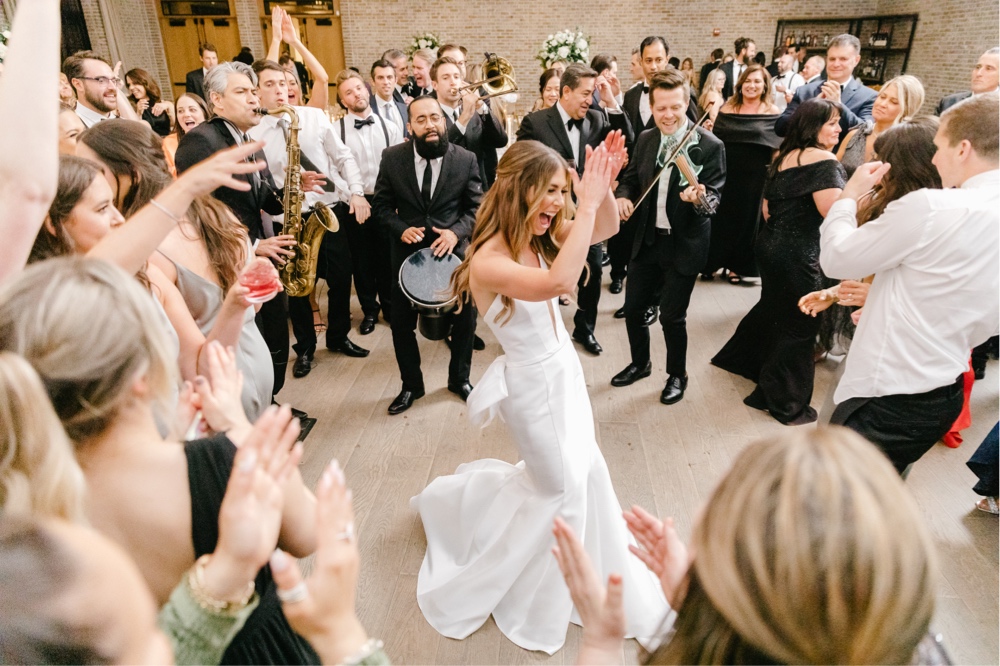 Bride dancing at a lively wedding reception in NJ