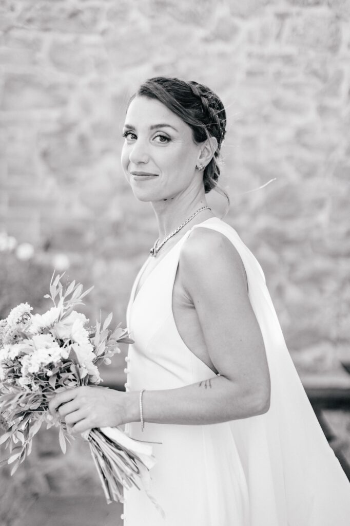 Bride smiling before her wedding ceremony at a destination wedding in Italy