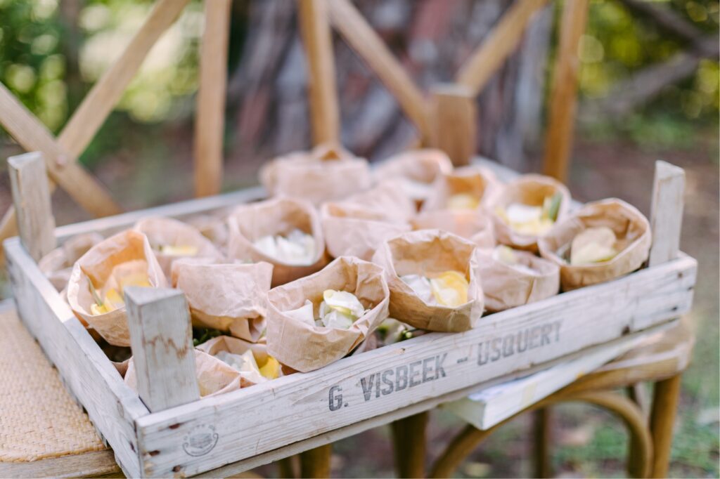 Petals in paper bags for guests to throw during an outdoor wedding in Italy