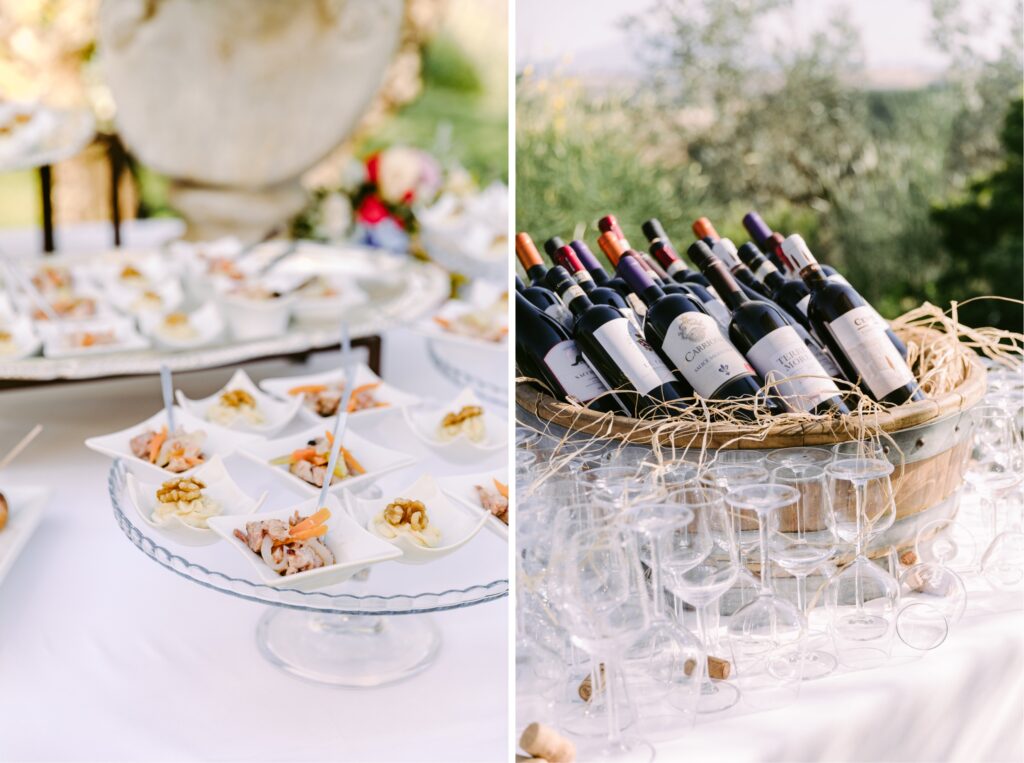 Red wine bottles and hors d'oeuvres during cocktail hour at an Italian estate