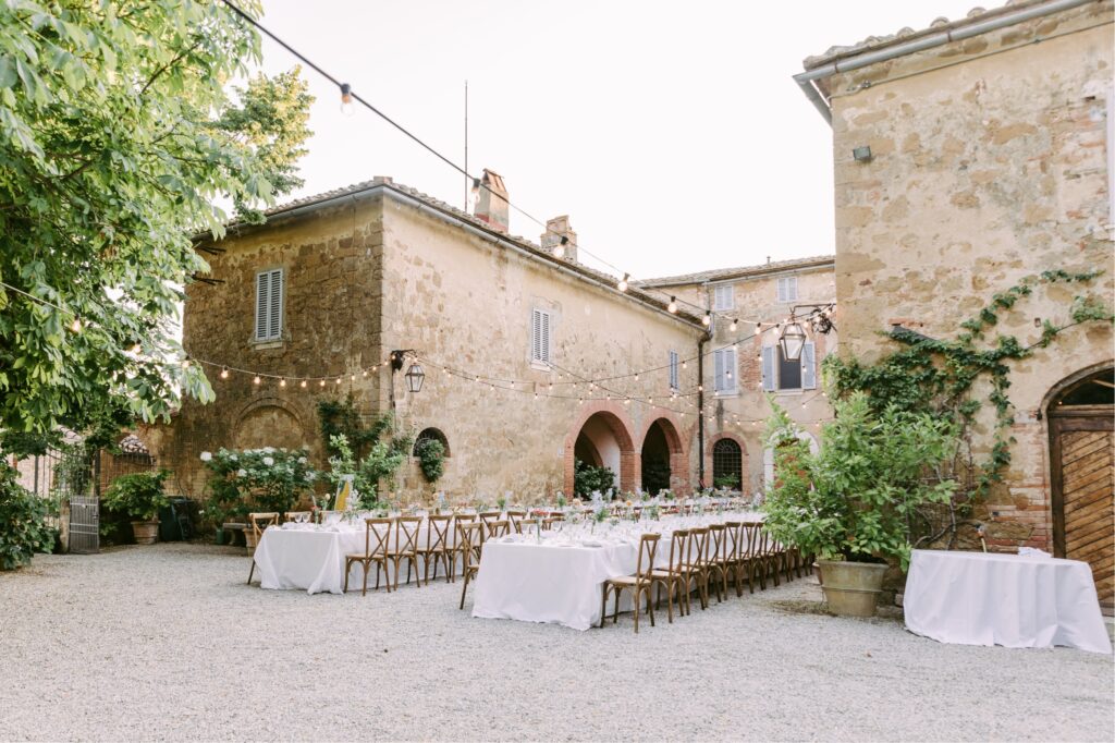 Outdoor courtyard wedding reception at an Italian estate wedding in Tuscany