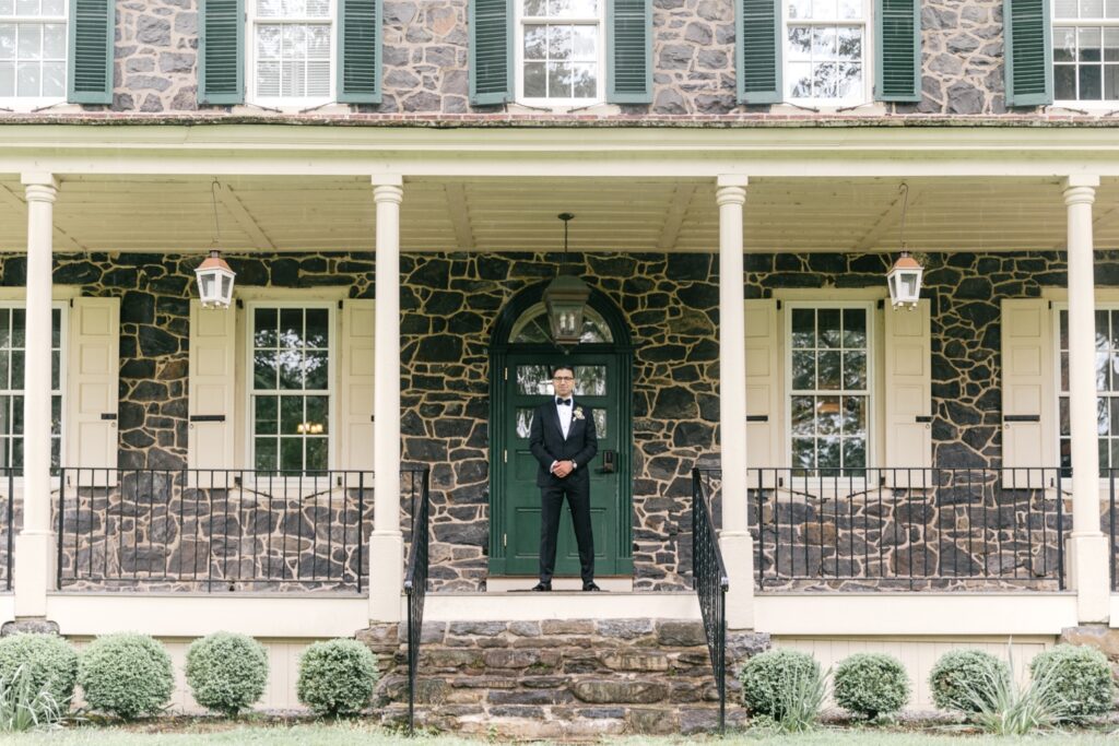 groom before the first look at the Inn at Grace Winery