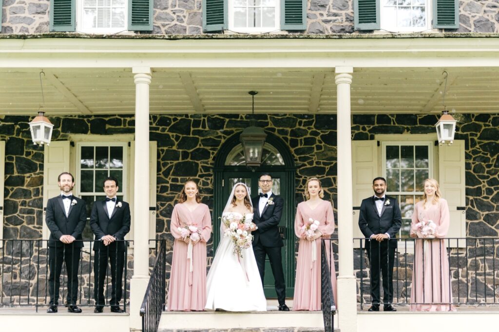 bride and groom with their wedding party in Glen Mills, Pennsylvania
