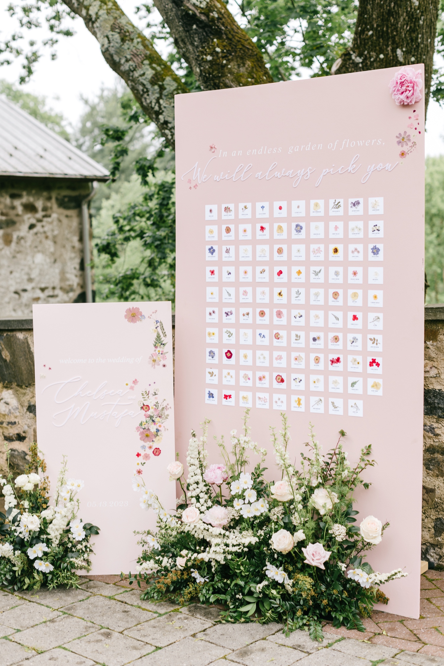 custom floral themed seating chart for a spring garden wedding reception