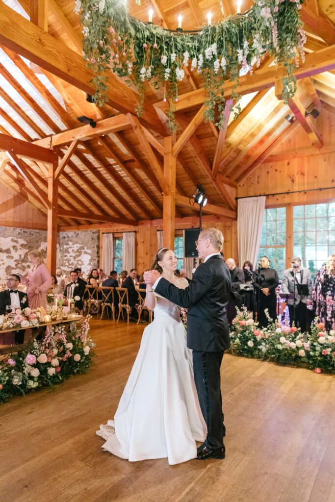 father daughter dance in a barn wedding reception