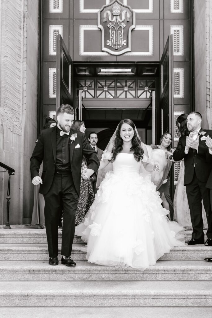 Bride and Groom exiting the Cathedral Basilica of Saints Peter and Paul in Philadelphia