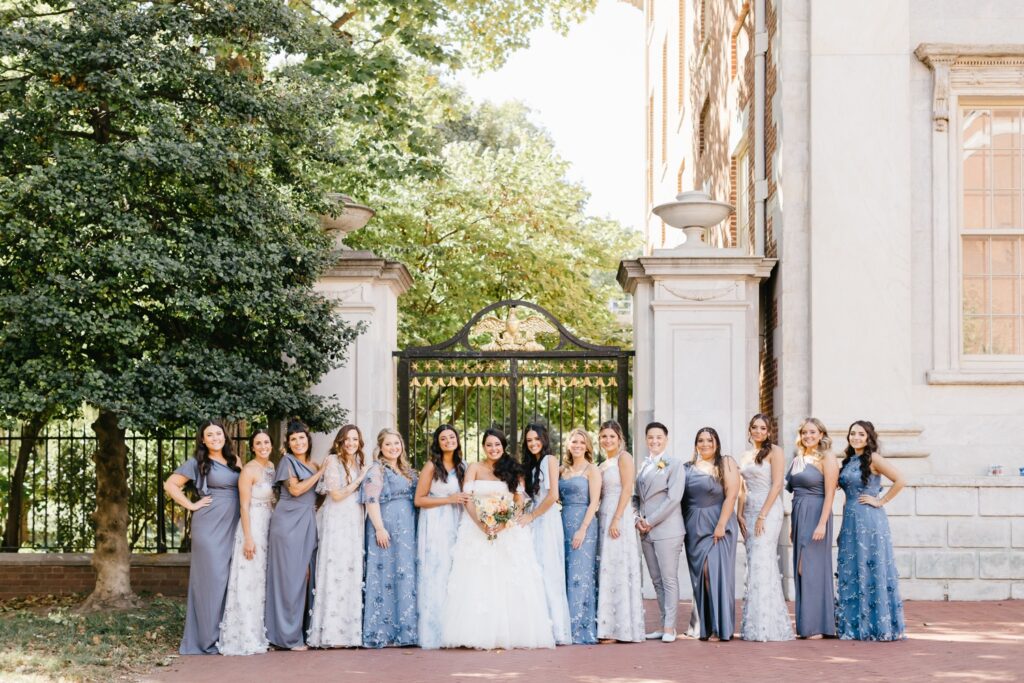 A Philadelphia Bridal party featuring bridesmaids in shades of blue