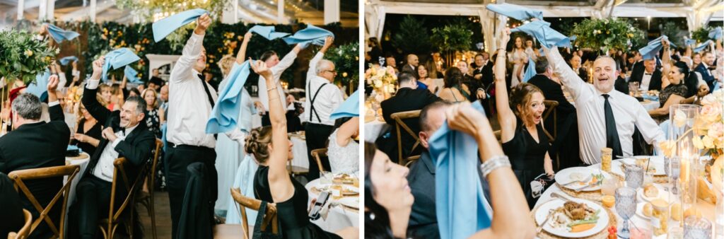 Guests cheering at Sicilian Inspired wedding reception by Emily Wren Photography