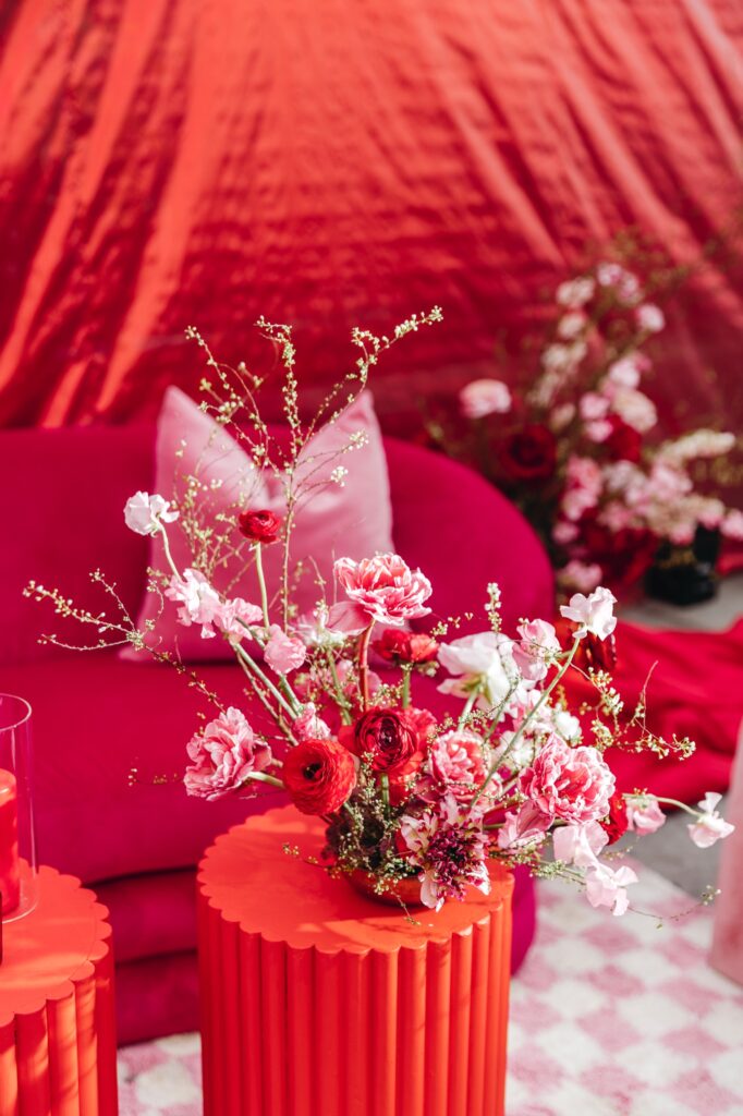 Red and Pink floral arrangement by Emily Wren Photography