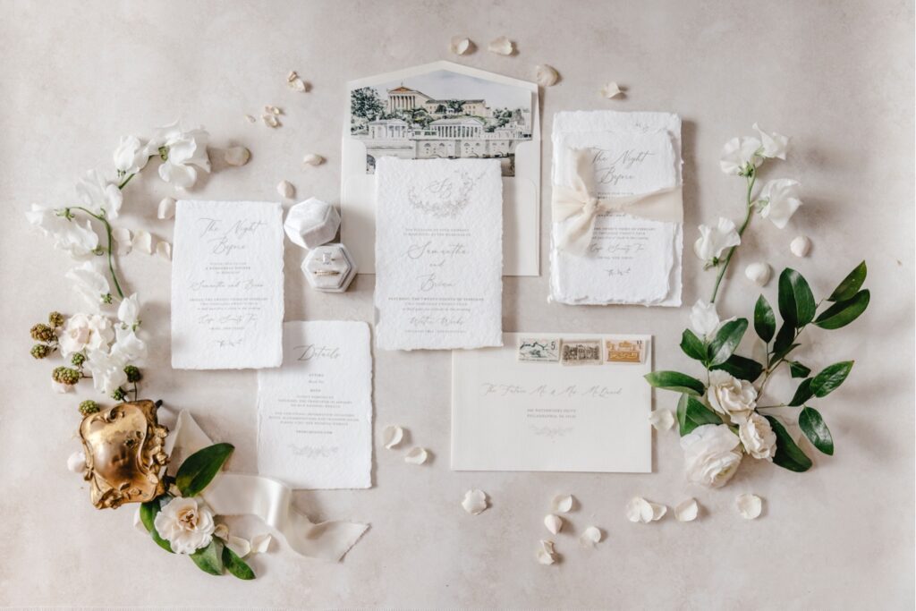 Paper goods wedding details including a waterpainting invitation of the Philadelphia Art Museum
